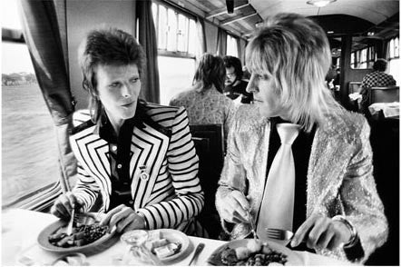 David Bowie & Mick Ronson, Lunch on the Train to Aberdeen 1973 by Mick Rock