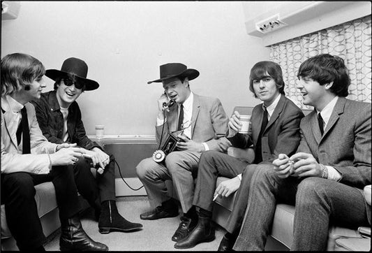 The Beatles with manager Brian Epstein, 1964 by Curt Gunther