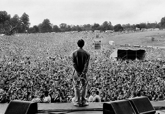 Oasis, Liam Gallagher onstage, Ireland, 1995, by Jill Furmanovsky