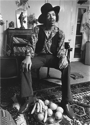 Jimi Hendrix at his home in Brooke St London, 1969 by Barrie Wentzell