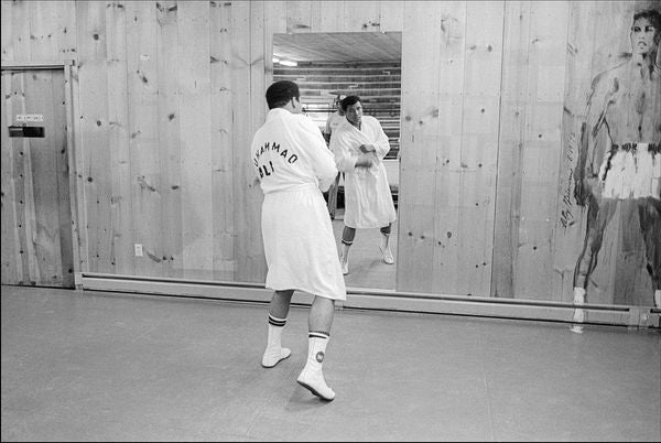 Muhammad Ali training, Deer Lake, Pennsylvania 1977 by Allan Tannenbaum