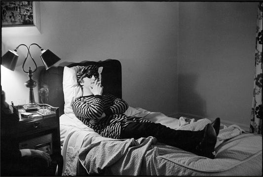 John Lennon in bed, 1964 by Curt Gunther