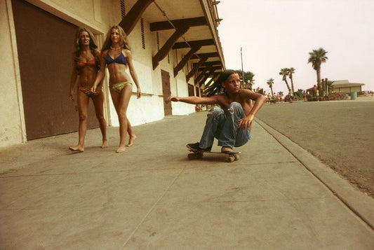 Sidewalk Surfer, Huntington Beach 1976 by Hugh Holland